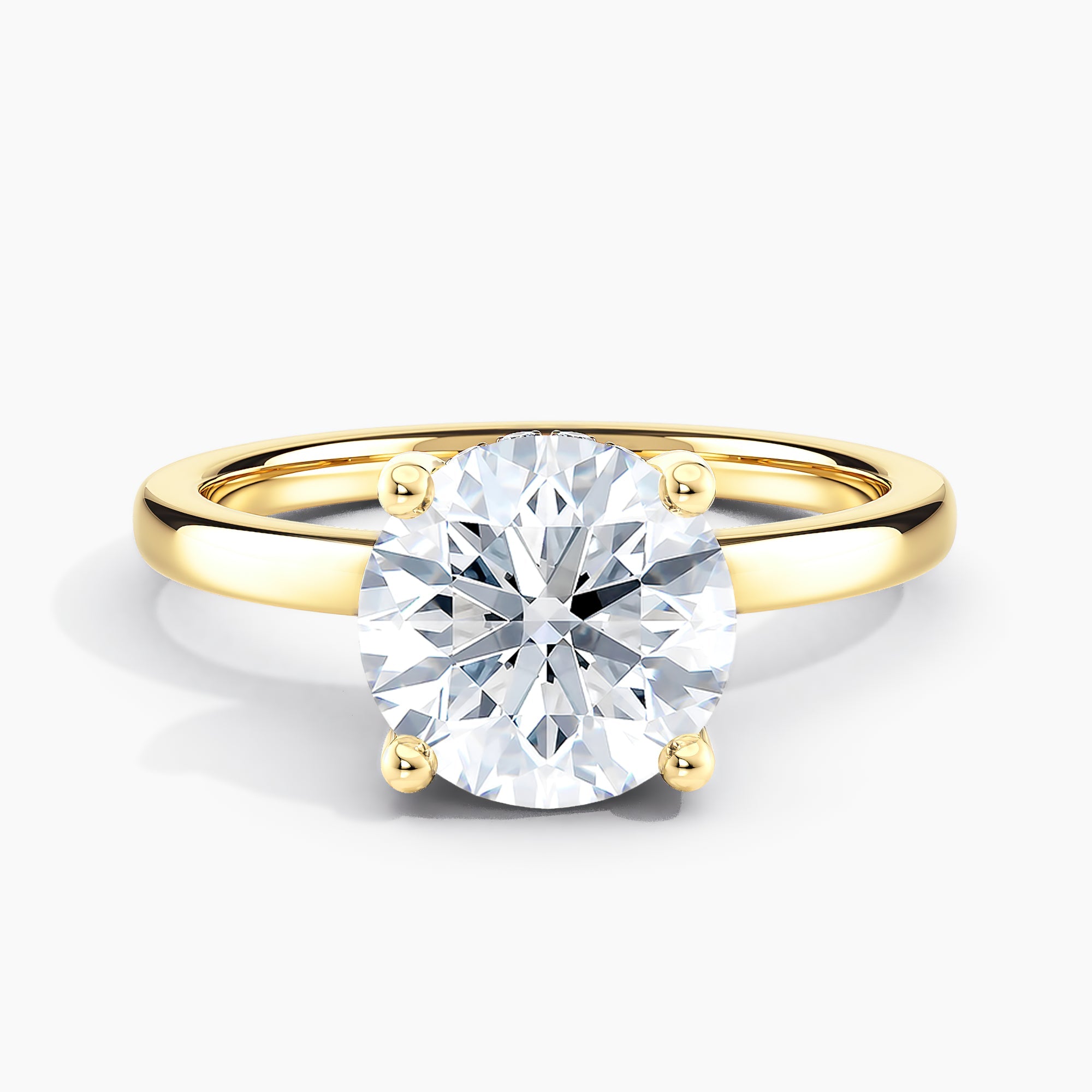 Round Diamond Solitaire Engagement Ring With Peek-a-boo Diamond Accents