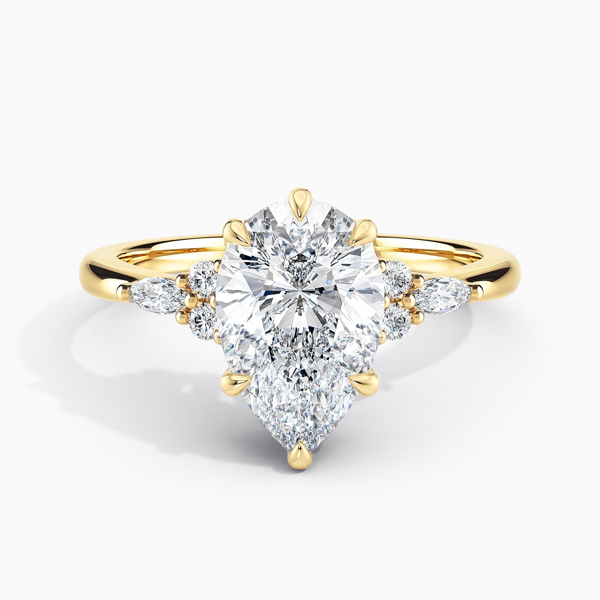 Pear Shape Nature Inspired Engagement Ring With Round And Marquise Accent Diamonds