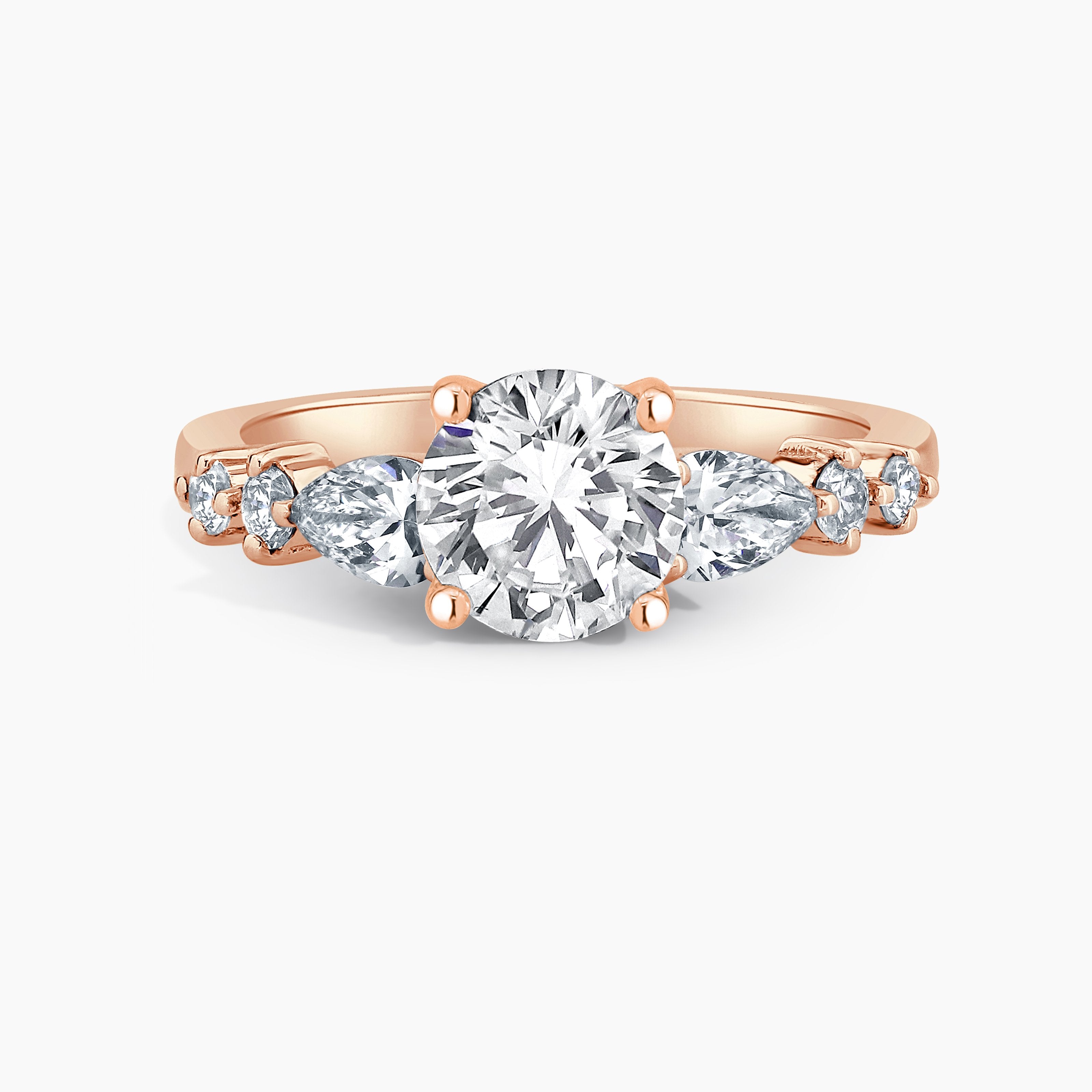 Round Diamond Engagement Ring With Pear And Round Diamond Accents