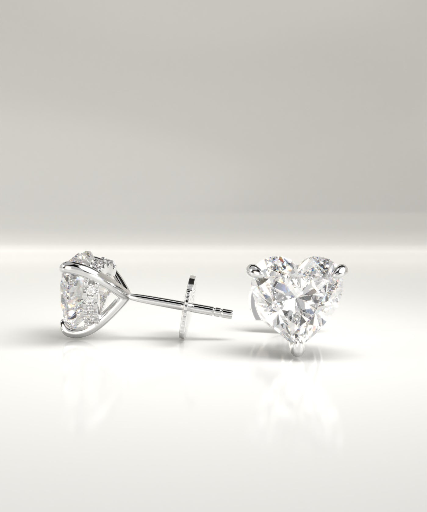 Hensley Heart Shape Lab-Grown Three Prong Hidden Halo Stud Earrings