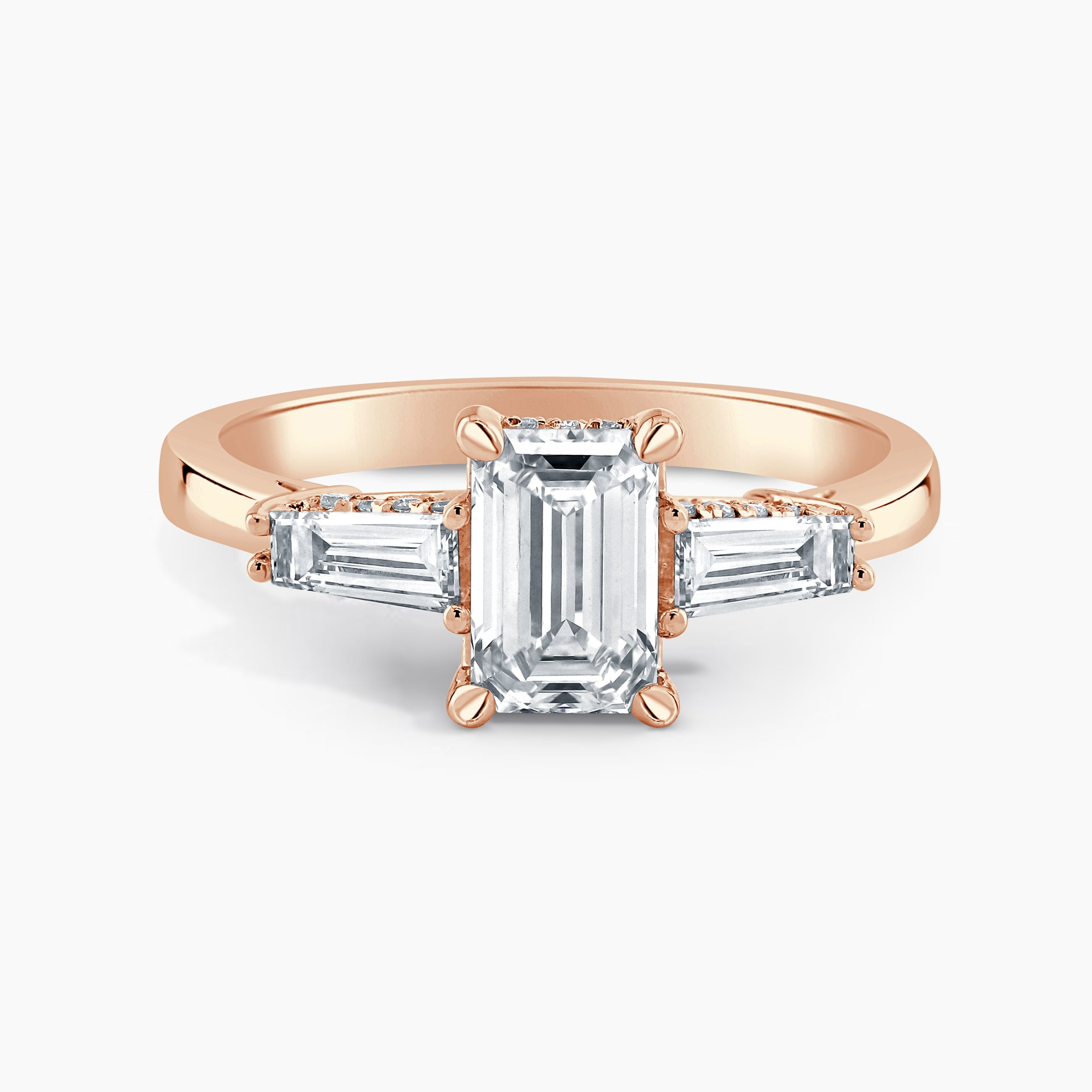 Emerald Cut Three Stone Ring With Baguettes And Hidden Halo