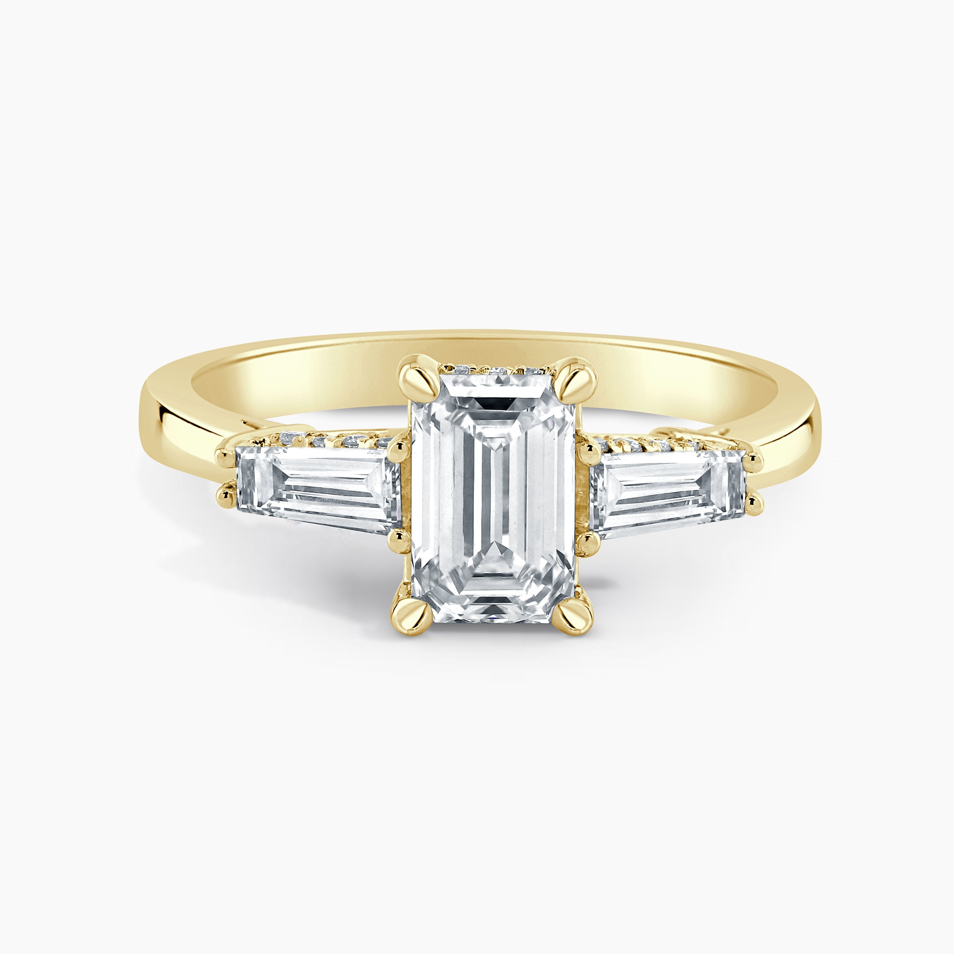 Emerald Cut Three Stone Ring With Baguettes And Hidden Halo