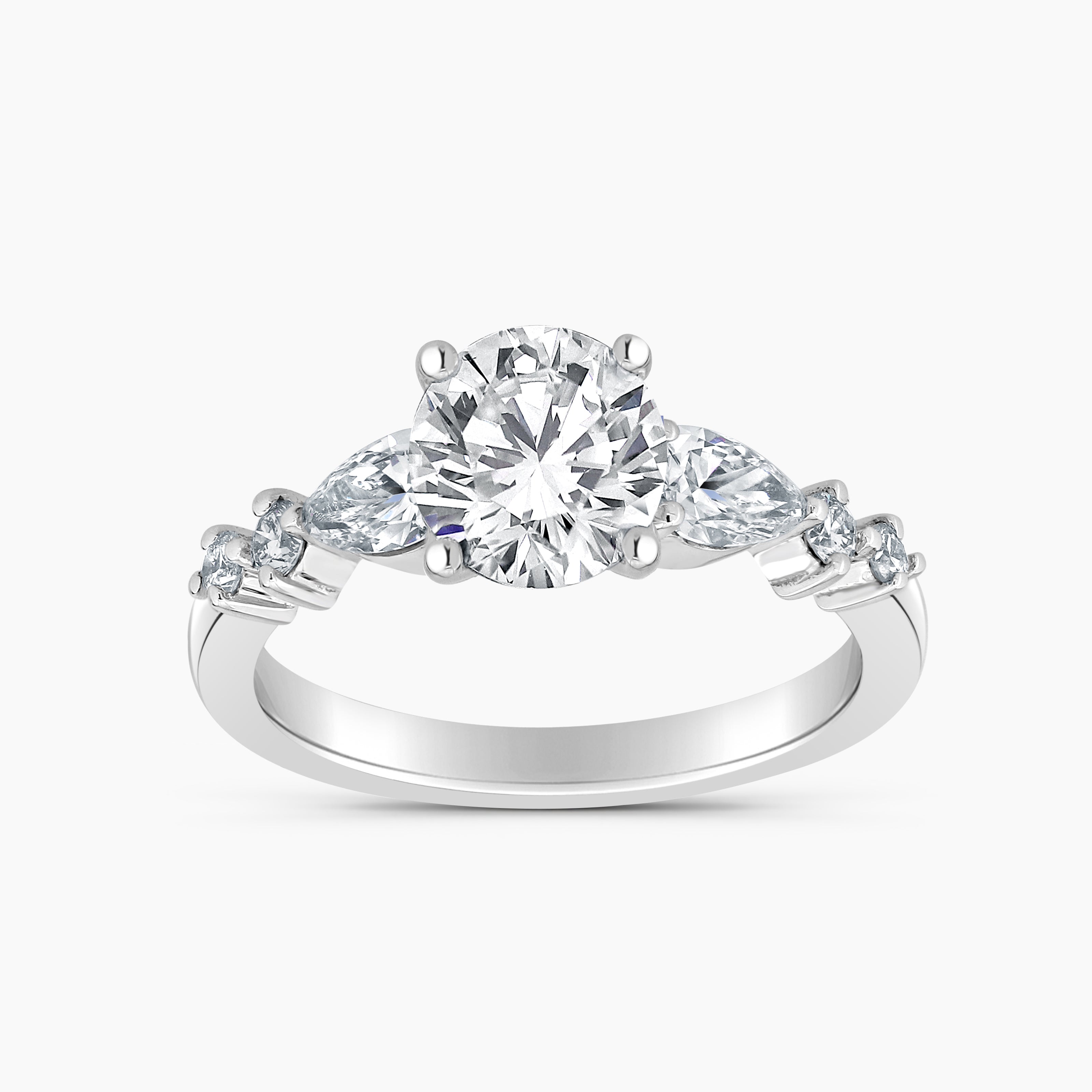 Round Diamond Engagement Ring With Pear And Round Diamond Accents