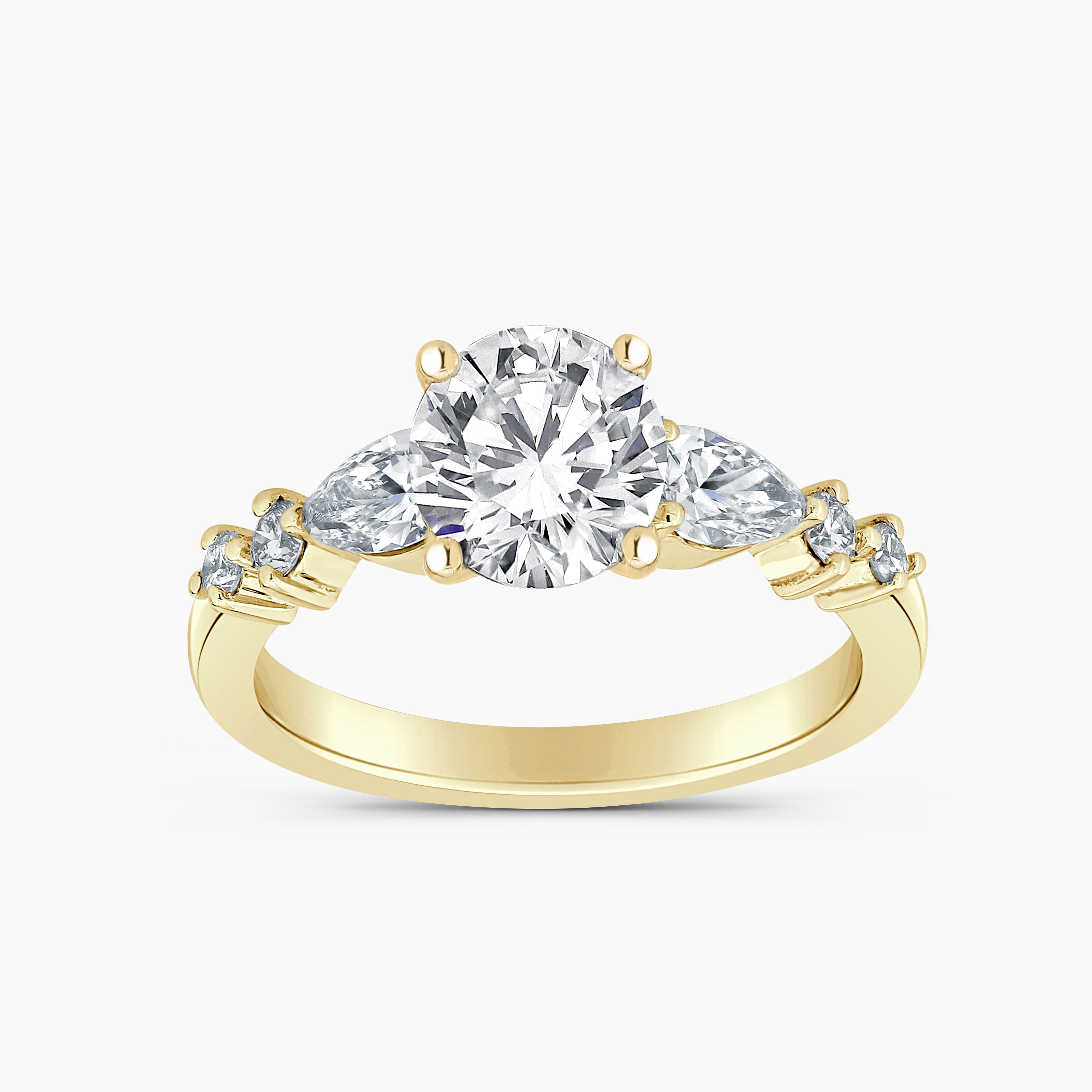 Round Diamond Engagement Ring With Pear And Round Diamond Accents
